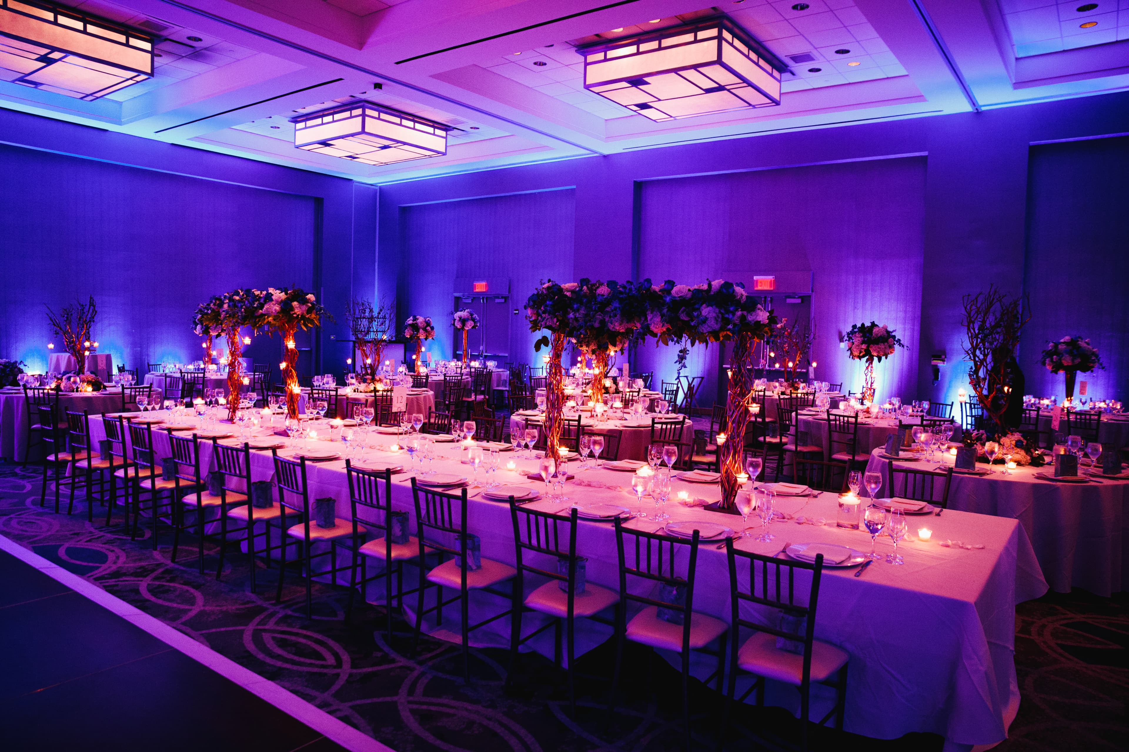 Elegant event dinner setup with ambient lighting