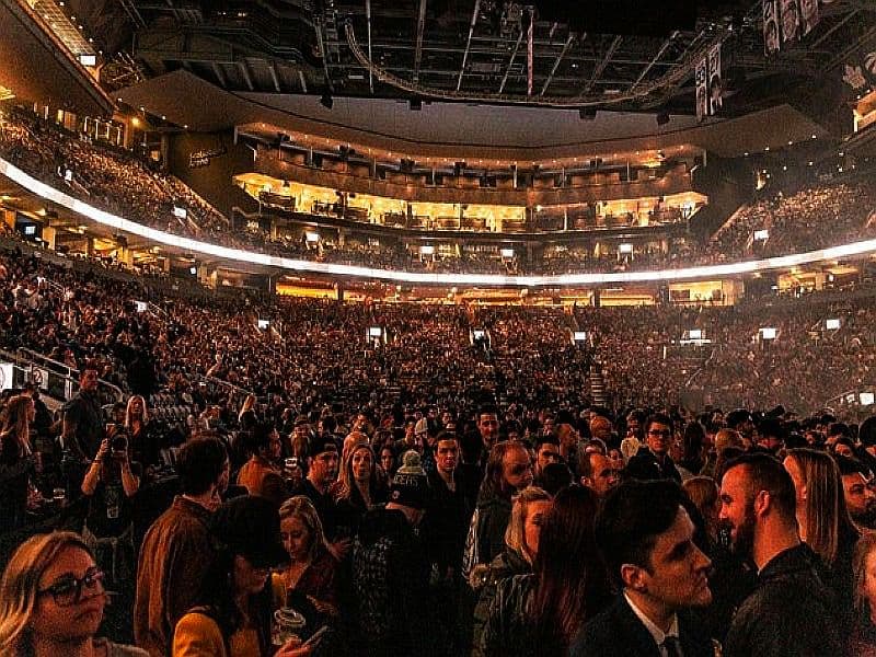 A large crowd of people enjoying a live event
